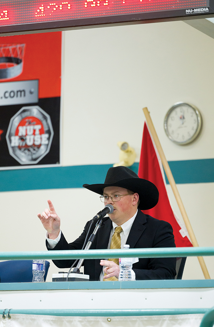  Ty Cutler auctioneering at Man/Sask Competition in Virden last year.<br />
